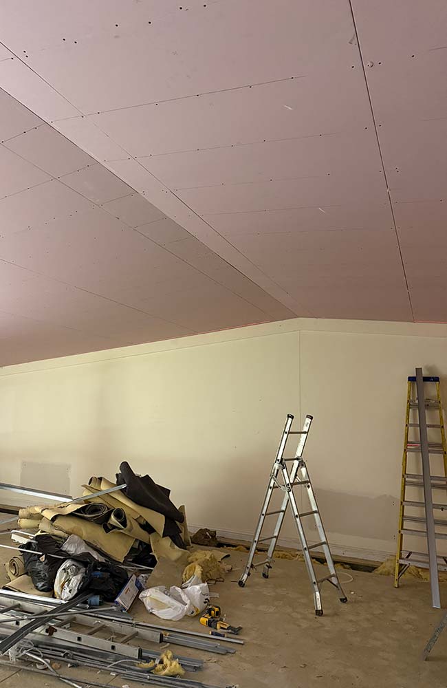 The team start preparing the space.