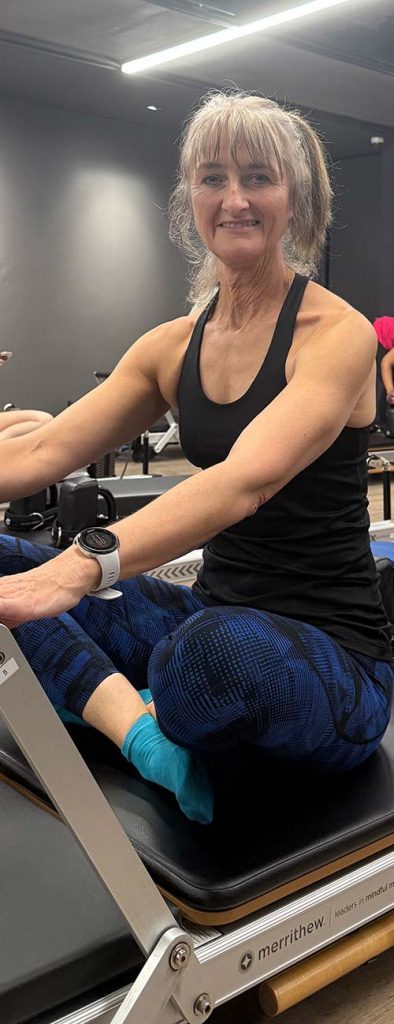 Rebecca On A Reformer Pilates Machine